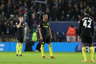 LEICESTER, ENGLAND - DECEMBER 10:  John Stones of Manchester City (L) is djected after Jamie Vardy of Leicester City (not pictured) scored his sides fourth goal during the Premier League match between Leicester City and Manchester City at the King Power Stadium on December 10, 2016 in Leicester, England.  (Photo by Christopher Lee/Getty Images)